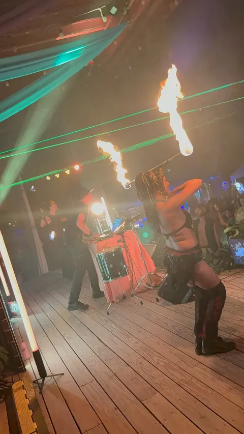 Fire dancers, lit gold