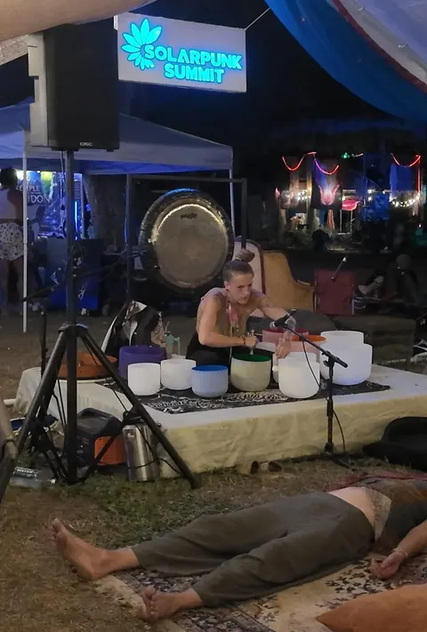 A sound bath under the night tents