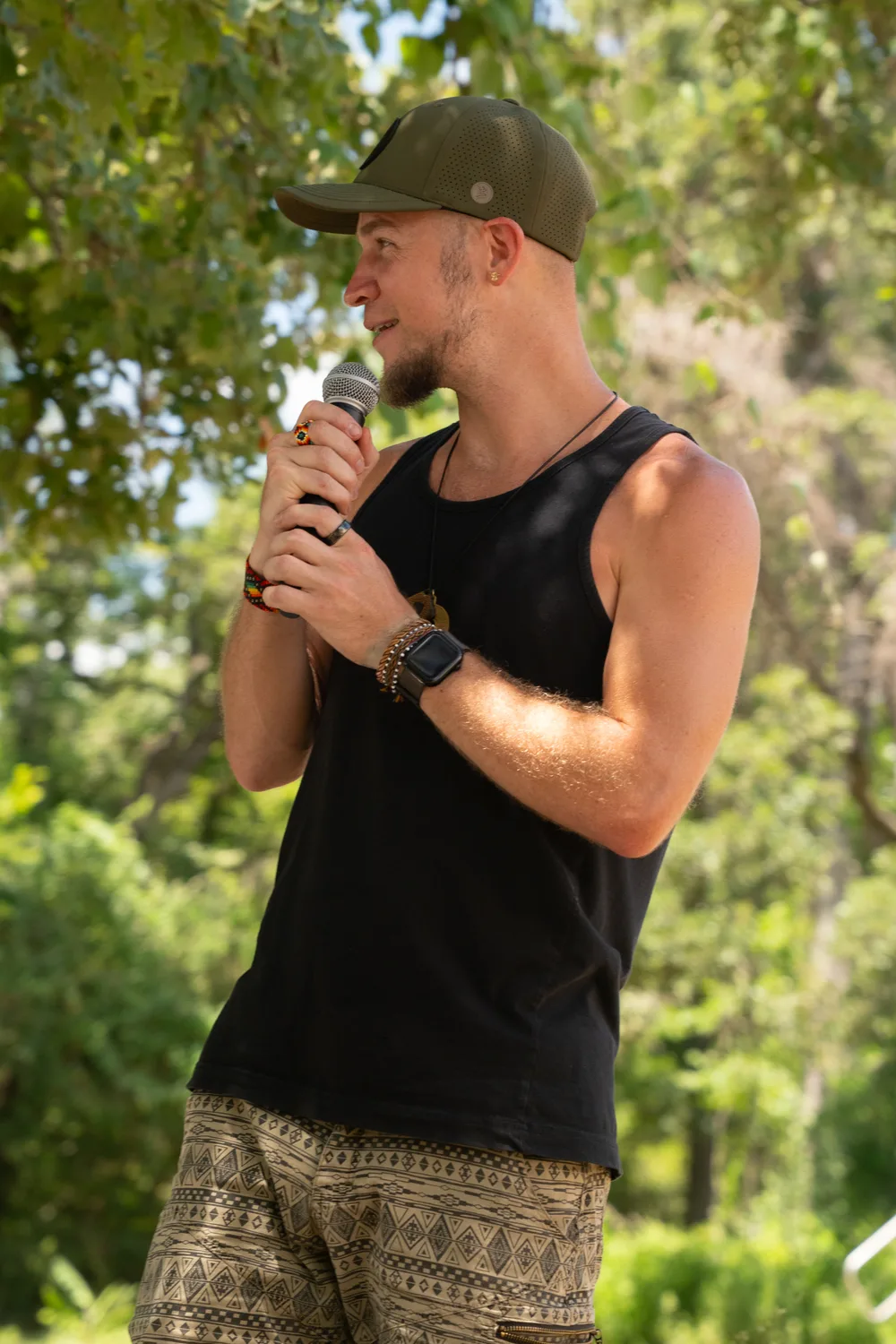 Tyzen with both hands on the mic at Declaration of Sovereignty