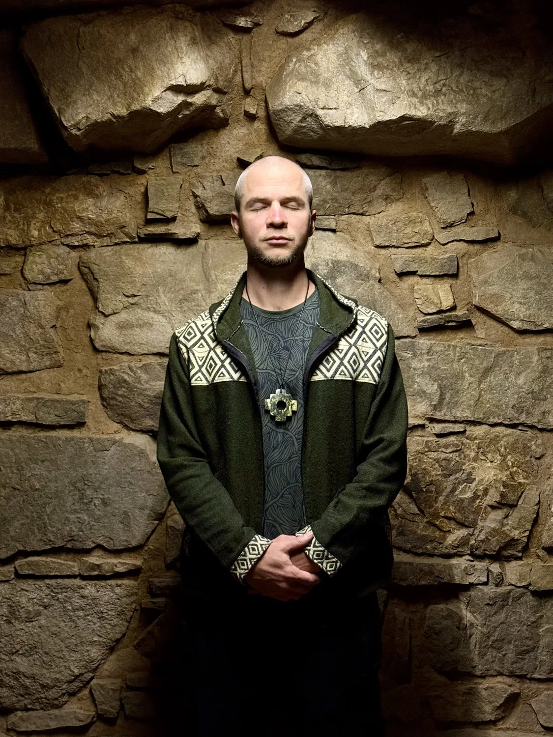 Tyler in ceremonial dress inside the Chavín catacombs