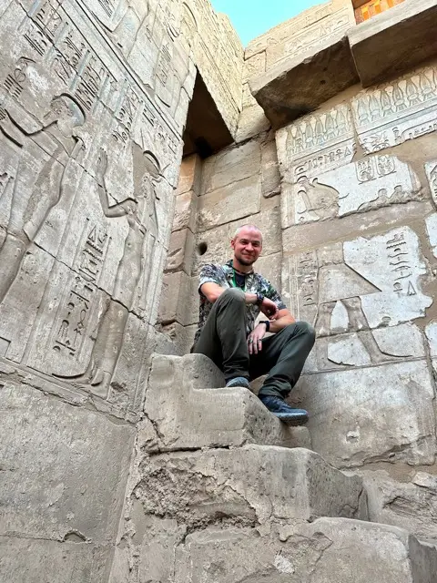 Tyler on the steps of Karnak